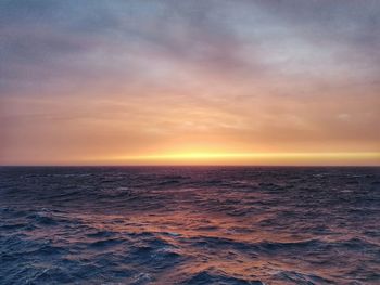 Scenic view of sea at sunset