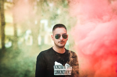 Portrait of young man wearing sunglasses