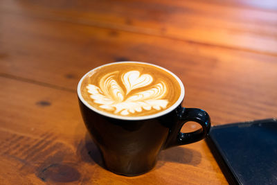 Coffee cup on table