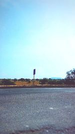 View of road against blue sky