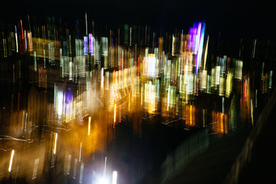 Reflection of illuminated lights on glass