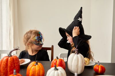 Side view of woman with teddy bear