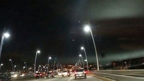 Illuminated street light at night