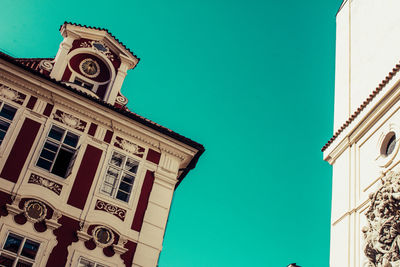 Low angle view of historical building against blue sky