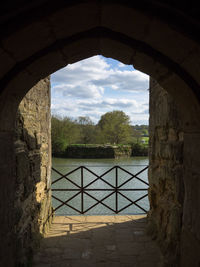 Trees seen through arch window