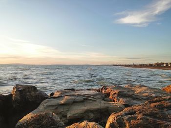 Scenic view of sea against sky during sunset