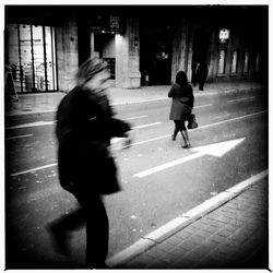 Woman walking on street