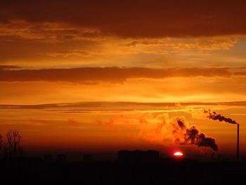 Scenic view of orange sky