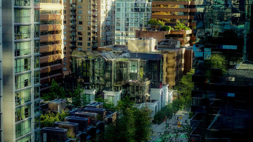 High angle view of street amidst buildings in city