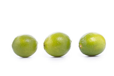 Close-up of fruits against white background