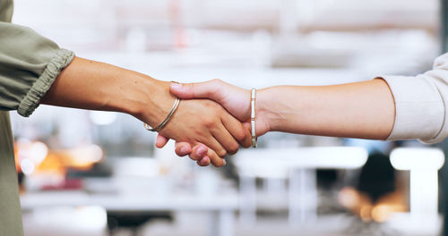 Cropped hand of man holding hands