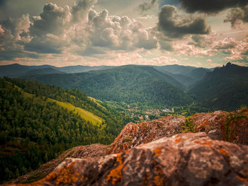 Scenic view of landscape against sky during sunset