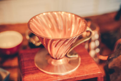 Close-up of cup on table