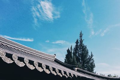 Low angle view of built structure against blue sky