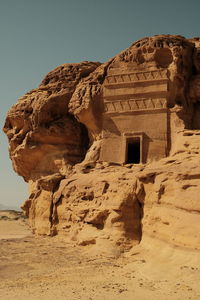 Low angle view of carved tomb