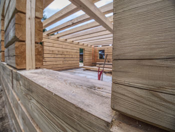 Corner of blockhouse from logs. connection of logs. wood annual rings. green building concept