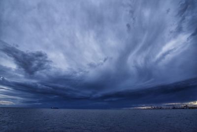 Scenic view of sea against sky at dusk