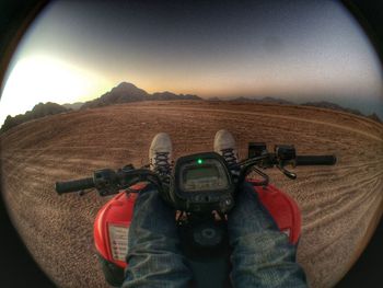 Close-up of hands against clear sky