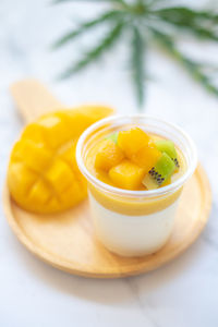 Close-up of fruit in plate on table