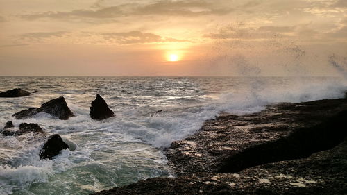 Scenic view of sea against sky during sunset