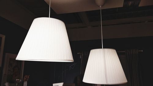 Close-up of illuminated pendant light at home