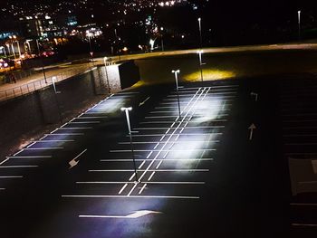 High angle view of illuminated road at night