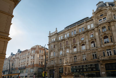 Low angle view of buildings against sky