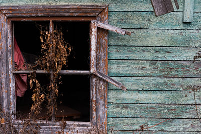 Window of old abandoned building