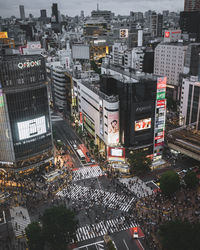 High angle view of street amidst buildings in city