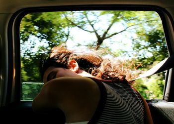 Exhausted woman during road trip