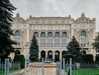Facade of historic building against sky