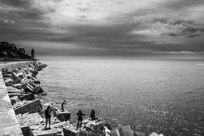 Scenic view of sea against cloudy sky