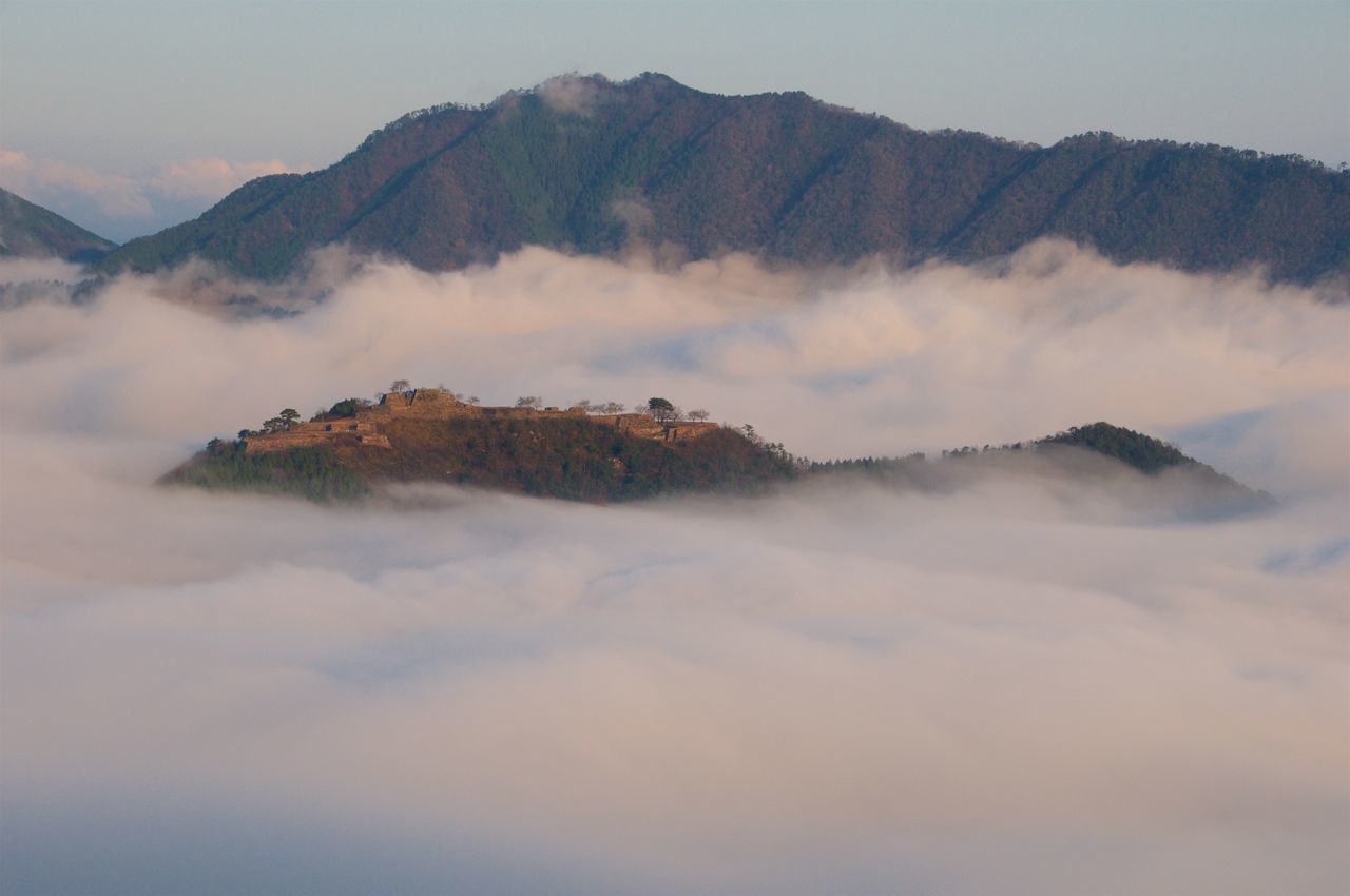 mountain, scenics, sky, beauty in nature, tranquil scene, tranquility, nature, cloud - sky, mountain range, weather, fog, physical geography, idyllic, landscape, majestic, travel destinations, non-urban scene, outdoors, travel, tourism