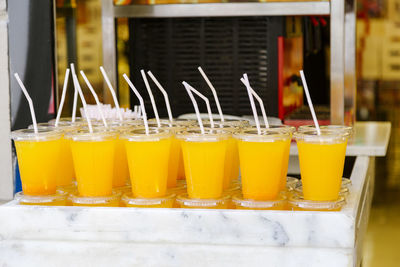 Orange juice in glasses on table