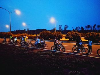 People on road at night