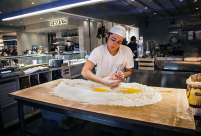 Man preparing food in kitchen