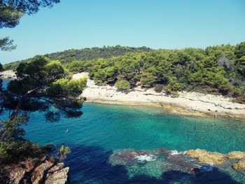 Scenic view of calm sea against clear sky