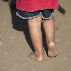 Low section of woman on beach