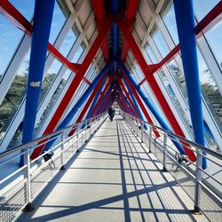 Low angle view of footbridge over footpath