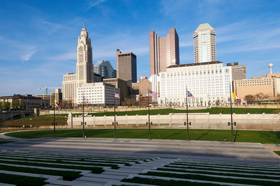 Modern buildings in city against sky