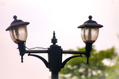 Close-up of street light against clear sky