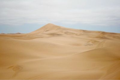 Scenic view of desert against sky