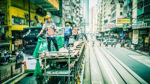 People working on city street