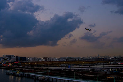 High angle view of cityscape against sky during sunset