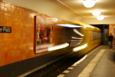 Train at railroad station at night