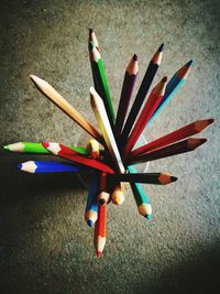 High angle view of multi colored pencils on table