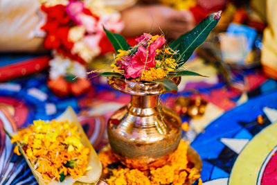 Close-up of multi colored flowers on table