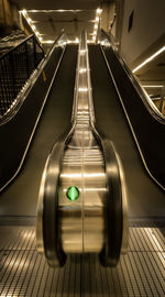 Interior of illuminated escalator