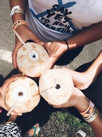 Low section of woman holding ice cream