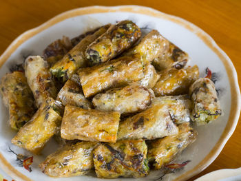 High angle view of meat in plate on table